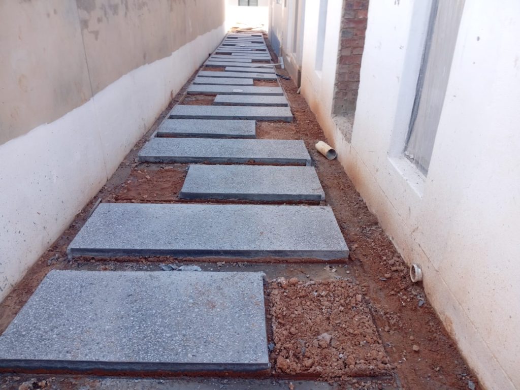 Exposed-aggregate-walkway-to-pool-Surrounds-Vep-Landscapers-jpg