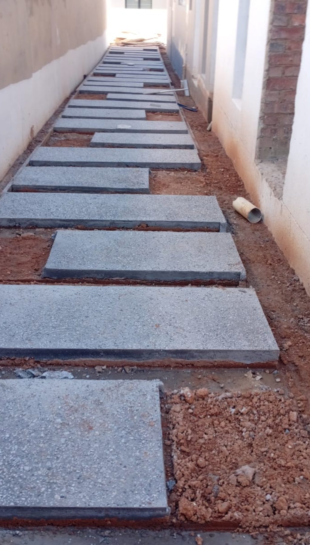Exposed-aggregate-walkway-to-pool-Surrounds-Vep-Landscapers-jpg