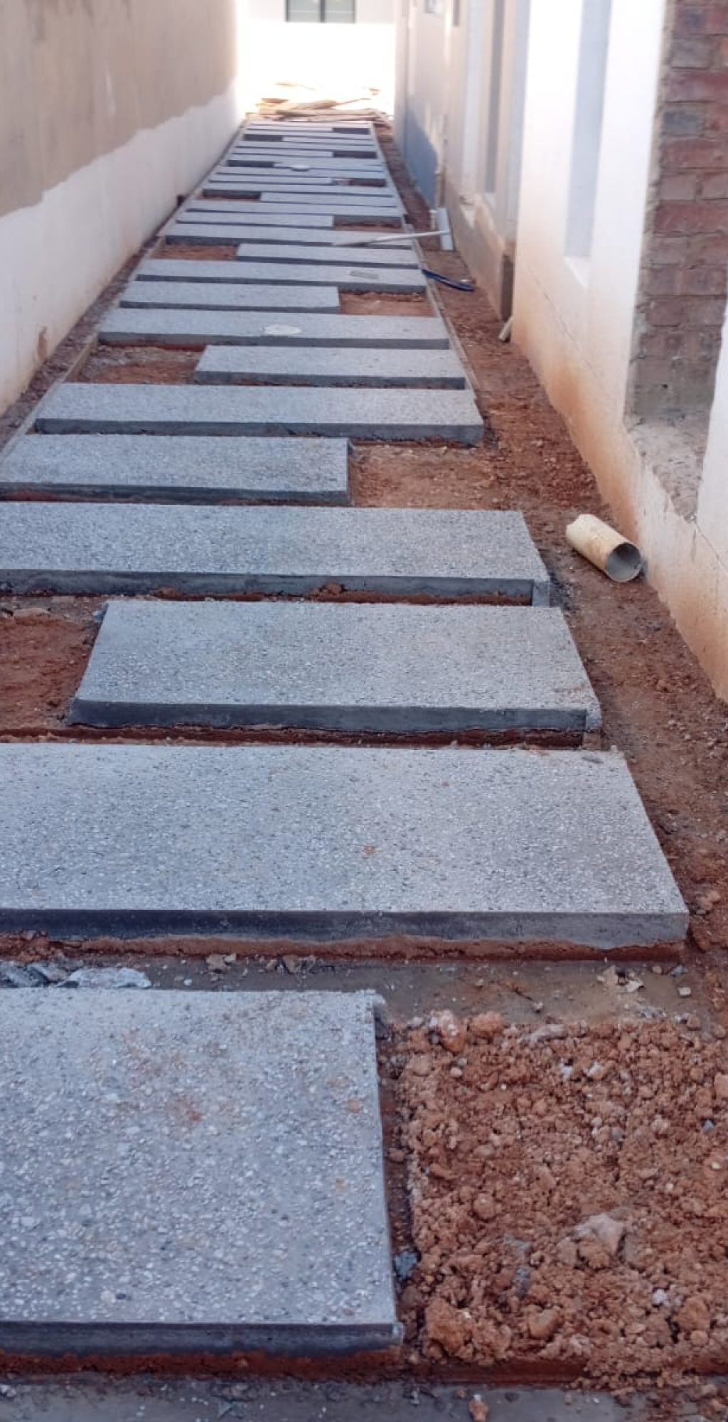 Exposed-aggregate-walkway-to-pool-Surrounds-Vep-Landscapers-jpg